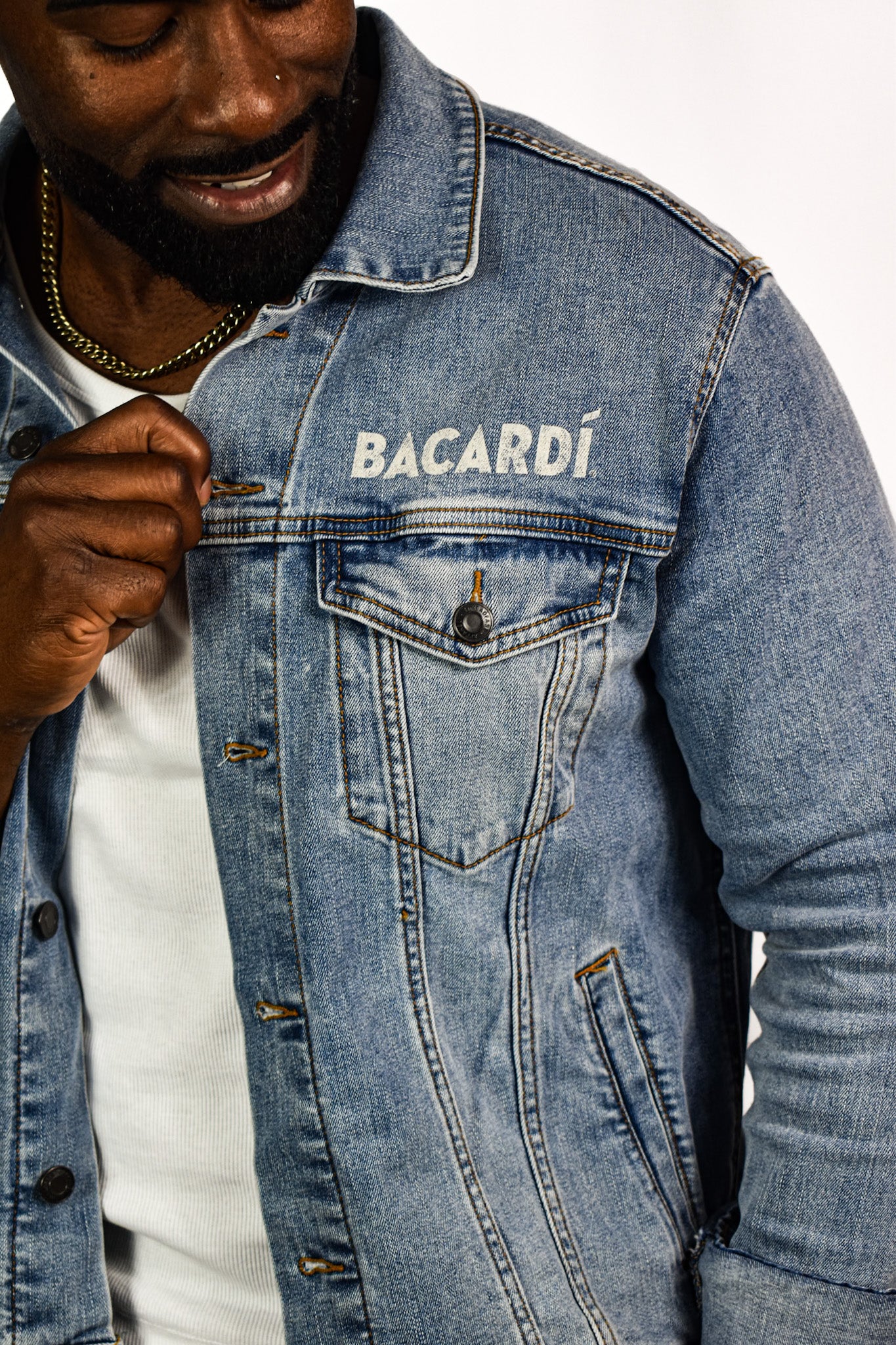 Close-up of Bacardi denim jacket chest detail showing “BACARDI” text above pocket